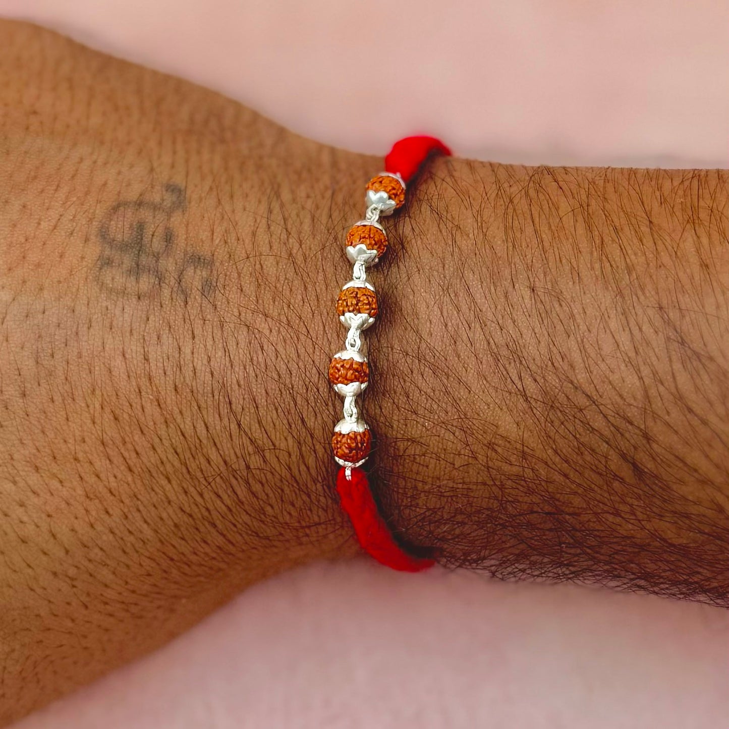 Silver Rudraksha Rakhi ( 5 Rudraksha )