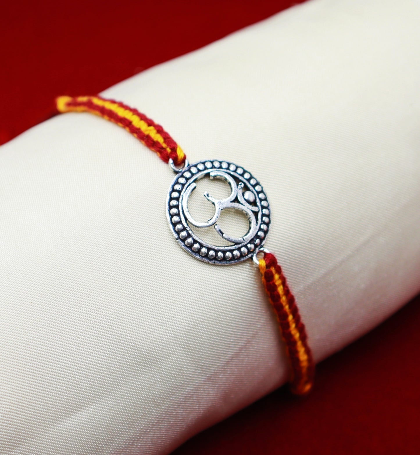 Antique Silver OM Rakhi