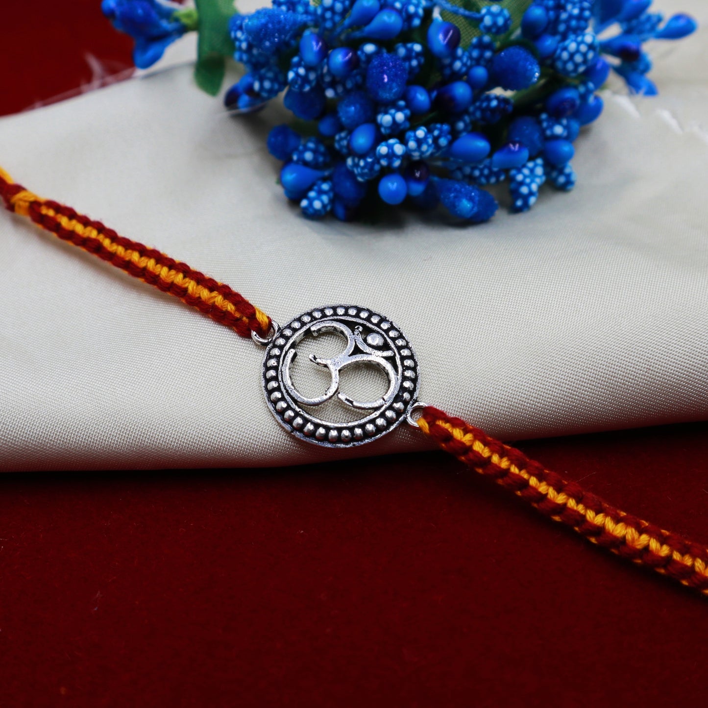 Antique Silver OM Rakhi