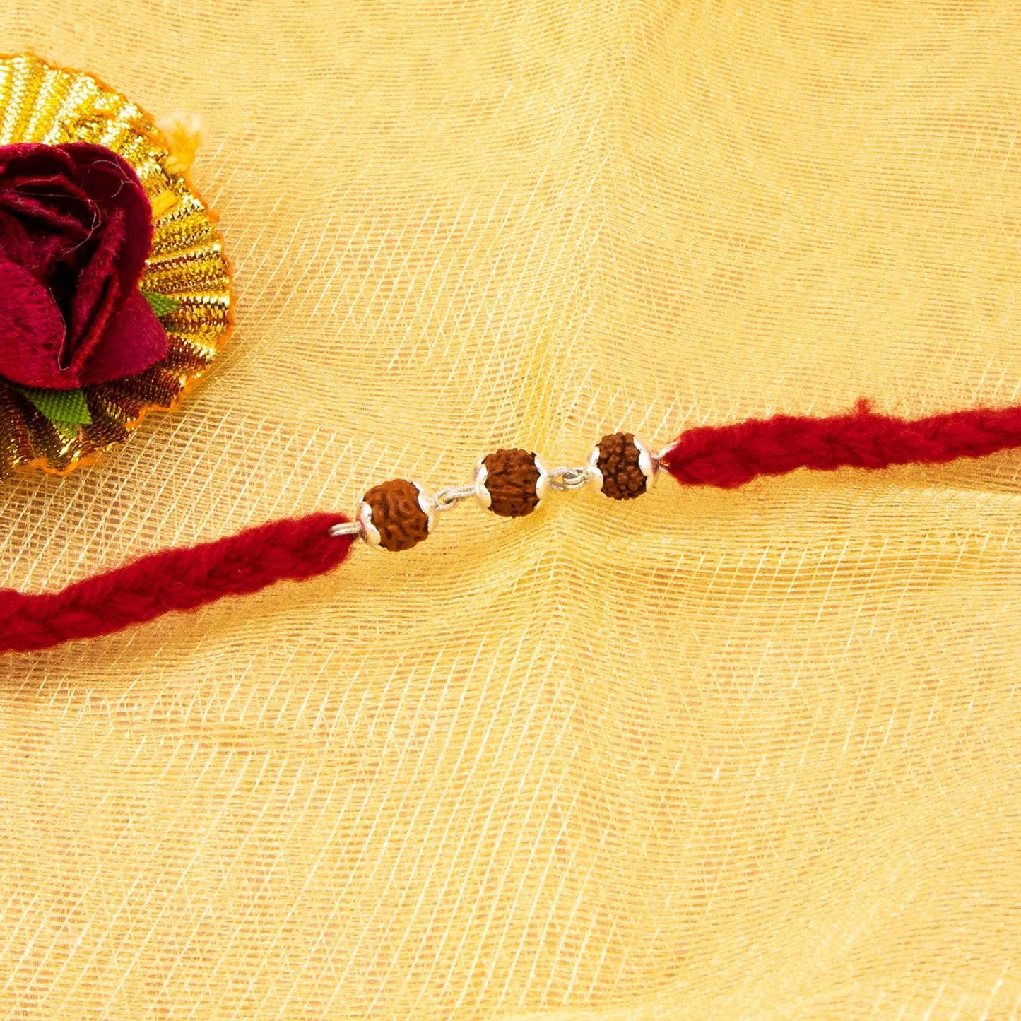 Silver Rudraksha Rakhi ( 3 Rudraksha )