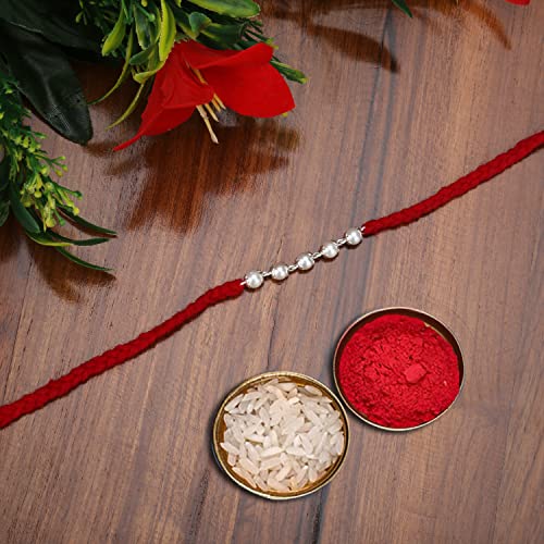 Silver Pearl Rakhi with Rudraksha Pendant
